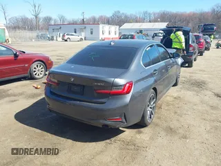 2021 BMW 3 Series 330i xDrive with VIN 3MW5R7J00M8B97750, listed as a IAAI auction lot 41810399 with 60,771 mi miles and . Bid and sale history available at DreamBid. Image 4.