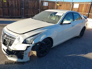 2014 Cadillac CTS Luxury AWD z VIN 1G6AX5SX3E0149360, wystawiony jako IAAI lot #41020479 z przebiegiem 98 917 mil mil oraz . Historia ofert i sprzedaży dostępna na DreamBid. Obrazek 16.