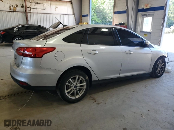 2016 Ford Focus SE с VIN 1FADP3F28GL280966, выставлен на аукционе Copart как лот 57911285 с пробегом Не указан миль и Списание • Salvage title. История ставок и продаж доступна на DreamBid. Изображение 3.
