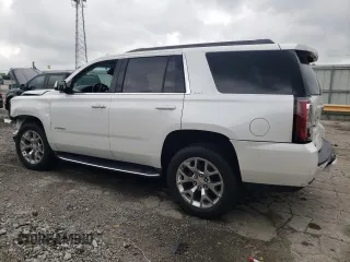 2016 GMC Yukon SLT with VIN 1GKS2BKC0GR265761, listed as a Copart auction lot 65645484 with 130,352 mi miles and Salvage Title. Bid and sale history available at carsss.com. Image 2.