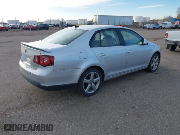 2010 Volkswagen Jetta Wolfsburg Edition with VIN 3VWRJ7AJ5AM049081, listed as a IAAI auction lot 41765760 with 123,621 mi miles and . Bid and sale history available at DreamBid. Image 4.