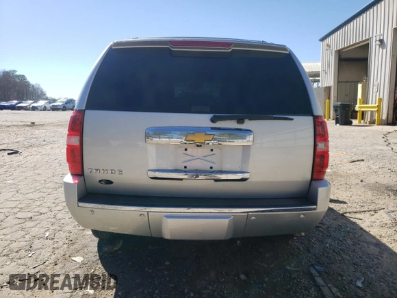 2013 Chevrolet Tahoe LTZ with VIN 1GNSCCE03DR374265, listed as a Copart auction lot 49290765 with 206,584 mi miles and Salvage title. Bid and sale history available at DreamBid. Image 6.