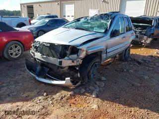 2004 Jeep Grand Cherokee Limited with VIN 1J4GW58S14C102826, listed as a IAAI auction lot 41081734 with 116,950 mi miles. Bid and sale history available at carsss.com. Image 2.