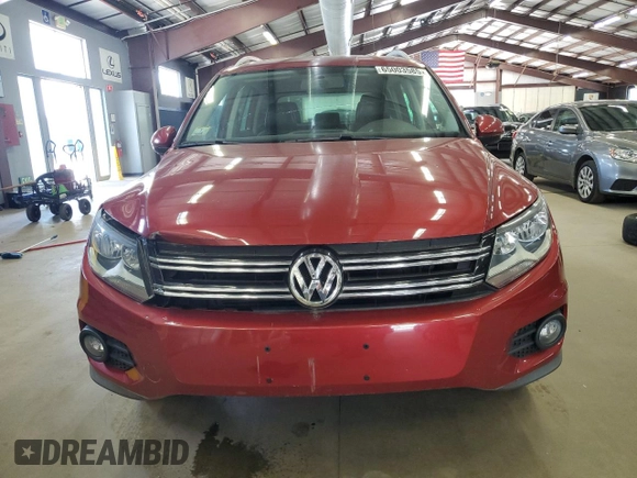 2014 Volkswagen Tiguan SEL с VIN WVGBV3AX8EW026076, выставлен на аукционе Copart как лот 65003585 с пробегом 104 473 миль миль и Чистый • Clean title. История ставок и продаж доступна на DreamBid. Изображение 5.