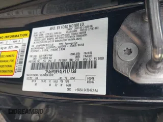 2020 Ford Fusion Titanium with VIN 3FA6P0K94LR117138, listed as a IAAI auction lot 42345819 with 88,117 mi miles and . Bid and sale history available at DreamBid. Image 9.