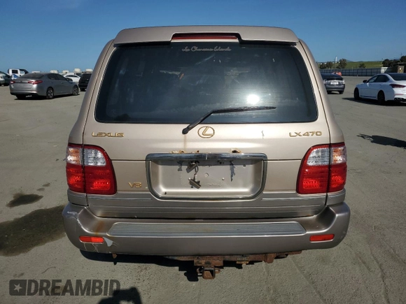 2001 Lexus LX 470 z VIN JTJHT00W213507042, wystawiony jako Copart lot #52634195 z przebiegiem 179 707 mil mil oraz Tytuł czysty. Historia ofert i sprzedaży dostępna na DreamBid. Obrazek 6.