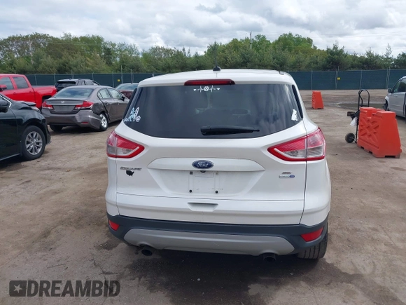 2016 Ford Escape SE z VIN 1FMCU9GX3GUB85250, wystawiony jako IAAI lot #42322056 z przebiegiem 187 833 mil mil oraz . Historia ofert i sprzedaży dostępna na DreamBid. Obrazek 16.
