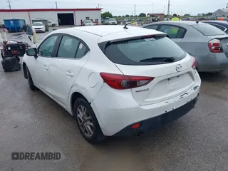 2014 Mazda 3 i Touring z VIN JM1BM1L73E1101014, wystawiony jako IAAI lot #42472127 z przebiegiem 121 426 mil mil oraz . Historia ofert i sprzedaży dostępna na DreamBid. Obrazek 3.