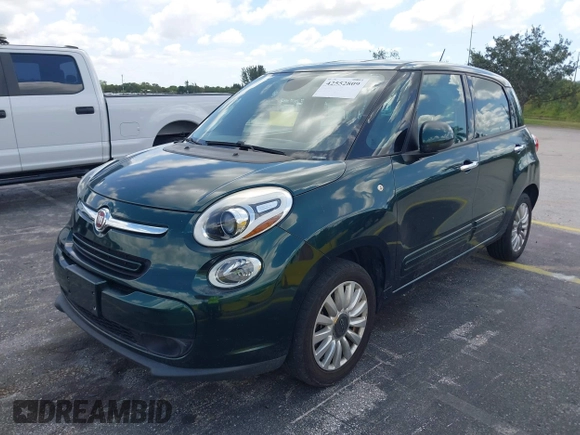 2014 FIAT 500L Easy with VIN ZFBCFABH0EZ014538, listed as a IAAI auction lot 42552809 with 97,225 mi miles and . Bid and sale history available at DreamBid. Image 2.