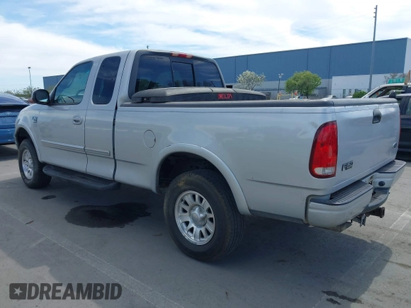 2001 Ford F-150 XL with VIN 1FTRX18L91KF29881, listed as a IAAI auction lot 42021554 with 199,041 mi miles. Bid and sale history available at carsss.com. Image 3.