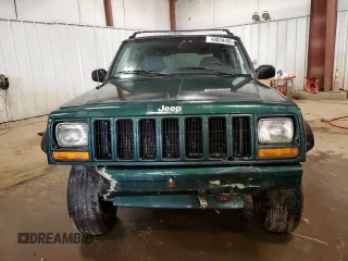 1997 Jeep Cherokee Country with VIN 1J4FJ78S8VL577137, listed as a Copart auction lot 48034405 with 156,154 mi miles and Salvage Title. Bid and sale history available at carsss.com. Image 5.