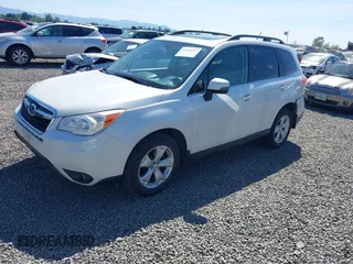 2014 Subaru Forester Touring with VIN JF2SJAPC4EH539193, listed as a IAAI auction lot 42444513 with 159,639 mi miles and . Bid and sale history available at DreamBid. Image 2.