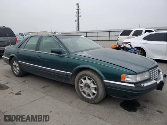 1997 Cadillac Seville Luxury SLS with VIN 1G6KS52YXVU816137, listed as a Copart auction lot 85664104 with 161,553 mi miles and Salvage Title. Bid and sale history available at carsss.com. Image 4.