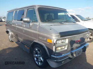 1993 GMC Vandura z VIN 1GDEG25K9PF513953, wystawiony jako IAAI lot #42194799 z przebiegiem 135 966 mil mil oraz . Historia ofert i sprzedaży dostępna na DreamBid. Obrazek 1.