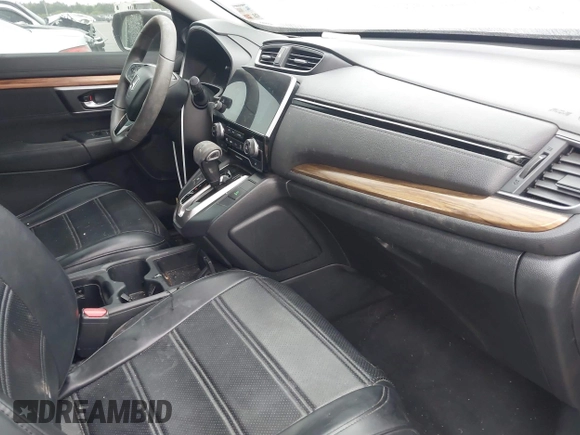 2017 Honda CR-V EX with VIN 7FARW1H59HE007171, listed as a IAAI auction lot 42033941 with 134,227 mi miles and . Bid and sale history available at DreamBid. Image 5.