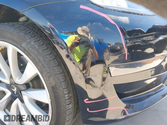 2020 Tesla Model 3 Standard Range Plus with VIN 5YJ3E1EAXLF614002, listed as a IAAI auction lot 41758898 with 42,363 mi miles and . Bid and sale history available at DreamBid. Image 6.