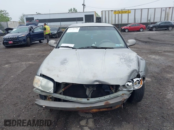 2004 Nissan Sentra S z VIN 3N1CB51D04L479005, wystawiony jako IAAI lot #42278120 z przebiegiem 157 829 mil mil oraz . Historia ofert i sprzedaży dostępna na DreamBid. Obrazek 13.