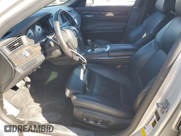 2013 BMW 7 Series 750i с VIN WBAYA8C54DC996698, выставлен на аукционе Copart как лот 53235915 с пробегом 116 247 миль миль и Списание • Salvage title. История ставок и продаж доступна на DreamBid. Изображение 7.