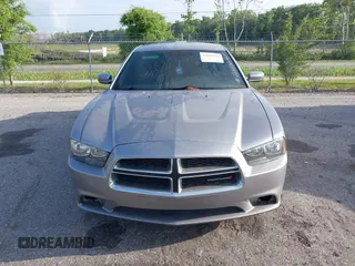2014 Dodge Charger SE with VIN 2C3CDXBGXEH284832, listed as a IAAI auction lot 42069294 with 186,273 mi miles and . Bid and sale history available at carsss.com. Image 12.