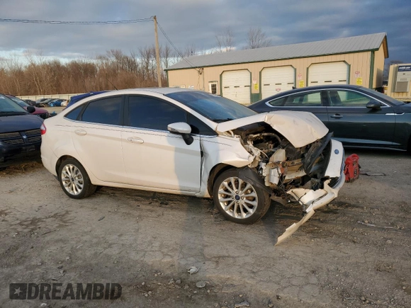 2017 Ford Fiesta Titanium with VIN 3FADP4CJ9HM136313, listed as a Copart auction lot 82610884 with Not Provided miles and Salvage Title. Bid and sale history available at DreamBid. Image 4.