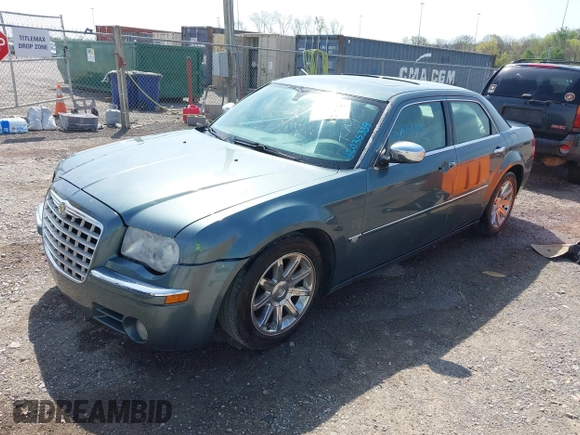 2006 Chrysler 300 C with VIN 2C3KA63H76H141246, listed as a IAAI auction lot 42035339 with 208,798 mi miles. Bid and sale history available at carsss.com. Image 2.
