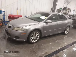 2006 Mazda 6 i with VIN 1YVFP80C865M23087, listed as a IAAI auction lot 41412551 with 148,395 mi miles and . Bid and sale history available at carsss.com. Image 2.