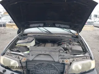 2001 BMW X5 3.0i with VIN WBAFA53501LM71185, listed as a IAAI auction lot 41610473 with 141,322 mi miles. Bid and sale history available at carsss.com. Image 10.