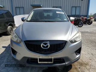2014 Mazda CX-5 Sport with VIN JM3KE2BE7E0334880, listed as a Copart auction lot 61780635 with 96,926 mi miles and Salvage title. Bid and sale history available at DreamBid. Image 5.