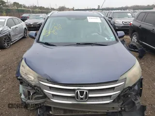 2014 Honda CR-V EX-L with VIN 5J6RM4H72EL092989, listed as a IAAI auction lot 42094182 with 152,319 mi miles. Bid and sale history available at carsss.com. Image 12.