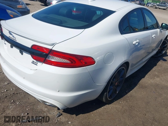 2015 Jaguar XF V6 Portfolio with VIN SAJWJ0FF9F8U48932, listed as a IAAI auction lot 41696899 with 203,110 mi miles. Bid and sale history available at carsss.com. Image 4.