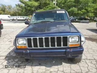 1997 Jeep Cherokee with VIN 1J4FN78S6VL604971, listed as a Copart auction lot 70690304 with 226,913 mi miles and Salvage title. Bid and sale history available at DreamBid. Image 5.