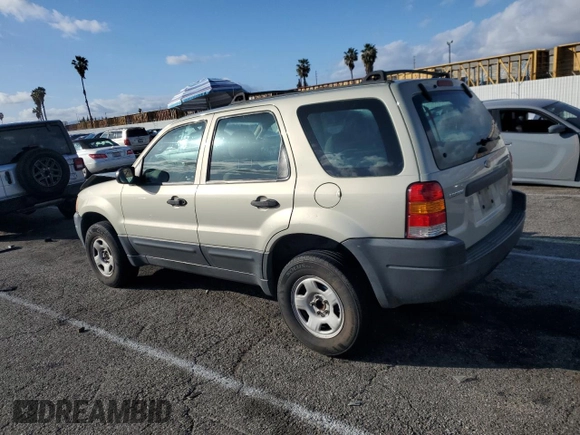 2004 Ford Escape XLS with VIN 1FMYU021X4KA41111, listed as a Copart auction lot 45393765 with 125,492 mi miles and Salvage Title. Bid and sale history available at DreamBid. Image 2.