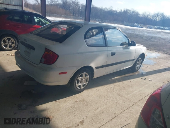 2004 Hyundai Accent with VIN KMHCF35C94U315390, listed as a IAAI auction lot 41391877 with 162,406 mi miles. Bid and sale history available at carsss.com. Image 4.