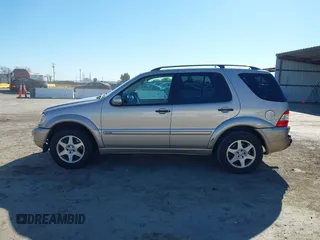 2002 Mercedes-Benz M 320/430/500 with VIN 4JGAB75E42A322824, listed as a IAAI auction lot 41871249 with 203,845 mi miles and . Bid and sale history available at carsss.com. Image 14.