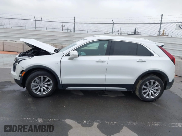 2022 Cadillac XT4 FWD Premium Luxury with VIN 1GYFZCR49NF100393, listed as a IAAI auction lot 42497187 with 23,672 mi miles and . Bid and sale history available at DreamBid. Image 14.