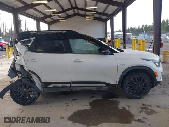 2023 Kia Seltos Nightfall with VIN KNDEUCA29P7350286, listed as a IAAI auction lot 41798975 with 1 mi miles. Bid and sale history available at carsss.com. Image 12.