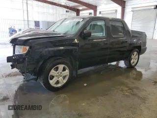 2011 Honda Ridgeline RTL with VIN 5FPYK1F55BB453242, listed as a Copart auction lot 56972085 with 257,290 mi miles and Salvage title. Bid and sale history available at DreamBid. Image 1.