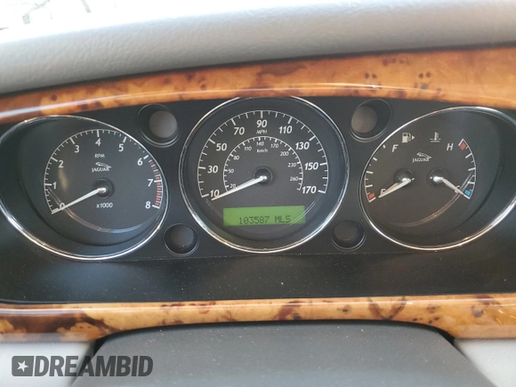 2005 Jaguar XJ with VIN SAJWA79C65SG45989, listed as a Copart auction lot 65357044 with 103,587 mi miles and Salvage Title. Bid and sale history available at carsss.com. Image 9.