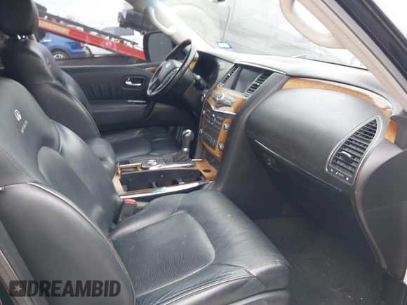 2011 Infiniti QX56 7-passenger z VIN JN8AZ2NF6B9500900, wystawiony jako IAAI lot #41585262 z przebiegiem 201 958 mil mil oraz . Historia ofert i sprzedaży dostępna na DreamBid. Obrazek 5.