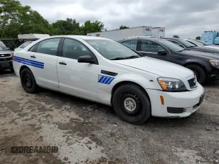 2014 Chevrolet Caprice z VIN 6G3NS5R38EL928027, wystawiony jako Copart lot #54709165 z przebiegiem 110 355 mil mil oraz Tytuł czysty. Historia ofert i sprzedaży dostępna na DreamBid. Obrazek 4.