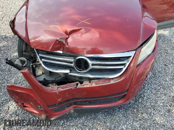 2011 Volkswagen Tiguan S z VIN WVGAV7AX3BW001598, wystawiony jako Copart lot #57518545 z przebiegiem 135 668 mil mil oraz Szkoda całkowita • Salvage title. Historia ofert i sprzedaży dostępna na DreamBid. Obrazek 12.