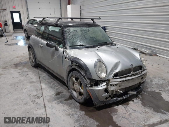 2002 MINI Hardtop with VIN WMWRC33422TC37296, listed as a IAAI auction lot 41385046 with 107,663 mi miles and . Bid and sale history available at DreamBid. Image 1.