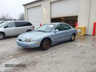 1997 Mercury Sable LS z VIN 1MELM53S0VG648365, wystawiony jako IAAI lot #41501814 z przebiegiem 256 352 mil mil oraz . Historia ofert i sprzedaży dostępna na DreamBid. Obrazek 2.