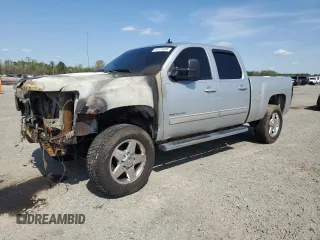 2013 GMC Sierra 2500HD SLT z VIN 1GT121E87DF142299, wystawiony jako Copart lot #51514695 z przebiegiem Nie podano mil oraz Szkoda całkowita • Salvage title. Historia ofert i sprzedaży dostępna na DreamBid. Obrazek 1.