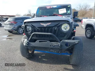 2020 Jeep Wrangler Unlimited Sport S with VIN 1C4HJXDG4LW221778, listed as a IAAI auction lot 41441662 with 76,026 mi miles and . Bid and sale history available at DreamBid. Image 12.
