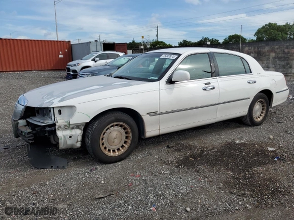 2002 Lincoln Town Car Executive with VIN 1LNHM81W82Y609104, listed as a Copart auction lot 75442374 with 324,612 mi miles and Salvage Title. Bid and sale history available at carsss.com. Image 1.