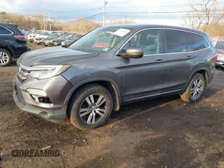 2016 Honda Pilot EX-L with VIN 5FNYF6H75GB053780, listed as a IAAI auction lot 41340590 with 203,190 mi miles. Bid and sale history available at carsss.com. Image 19.