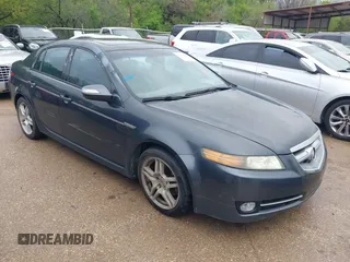 2007 Acura TL with VIN 19UUA66257A001595, listed as a IAAI auction lot 41913894 with 217,056 mi miles. Bid and sale history available at carsss.com. Image 1.