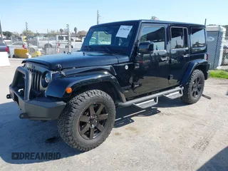 2014 Jeep Wrangler Unlimited Sahara with VIN 1C4BJWEG0EL306202, listed as a IAAI auction lot 41784330 with 79,123 mi miles. Bid and sale history available at carsss.com. Image 17.