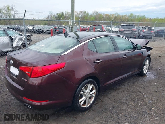 2013 Kia Optima EX with VIN 5XXGN4A73DG147517, listed as a IAAI auction lot 41959679 with 133,810 mi miles and . Bid and sale history available at DreamBid. Image 4.
